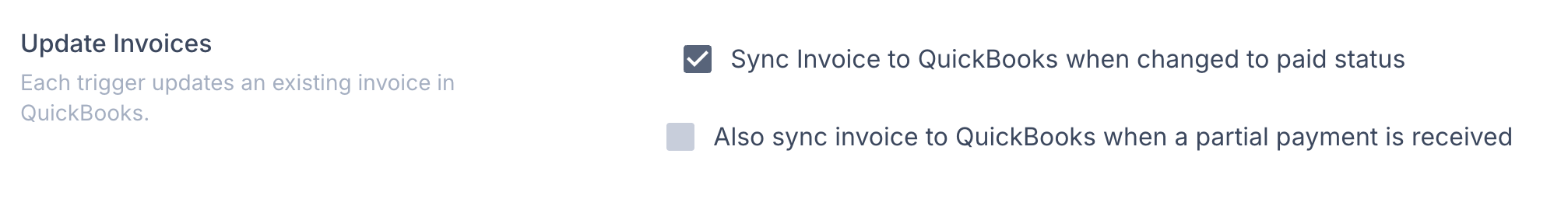 Screenshot showing the Update Invoices setting for syncing paid invoices to QuickBooks